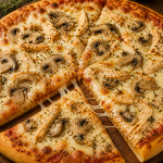 Homemade chicken mushroom pizza with melted mozzarella cheese and golden crust